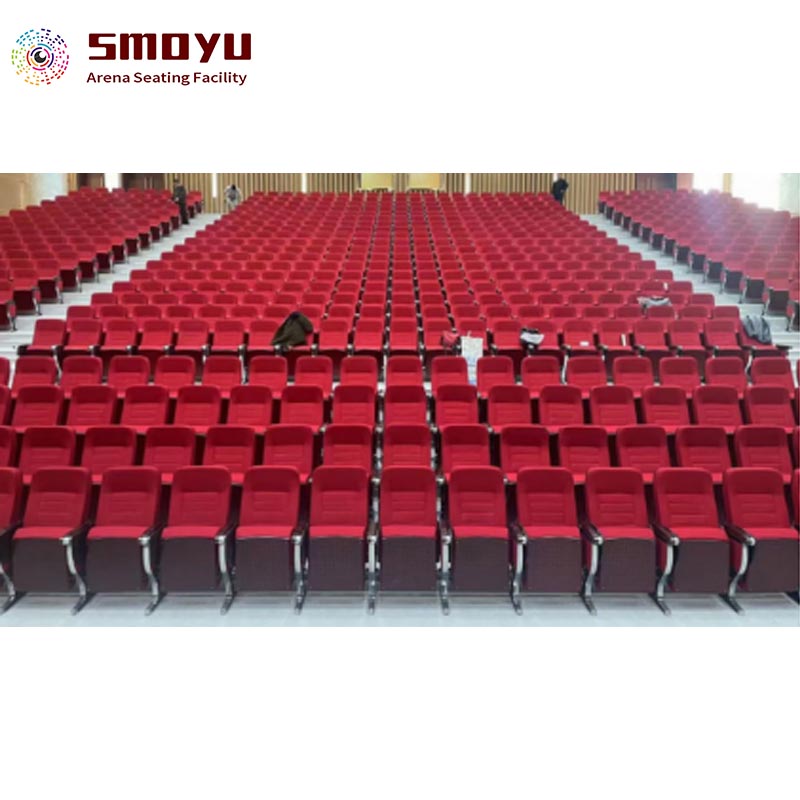 Sectional cinema seating with oak armrest and PU foam cushions in modern auditorium